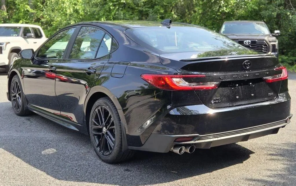Black Toyota Camry Seen The Fuel Tank Cap From behind